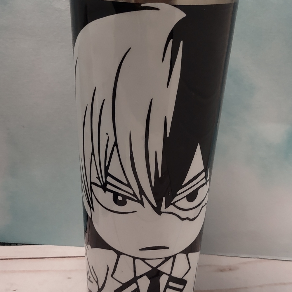 20 oz anime tumbler black and white with an anime